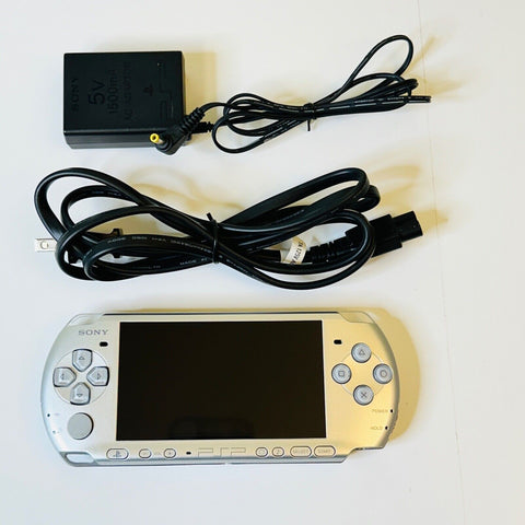 Sony PSP 3001 Mystic Silver Handheld System Console with Brand New Battery.