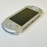 Sony PSP 3001 Mystic Silver Handheld System Console with Brand New Battery.