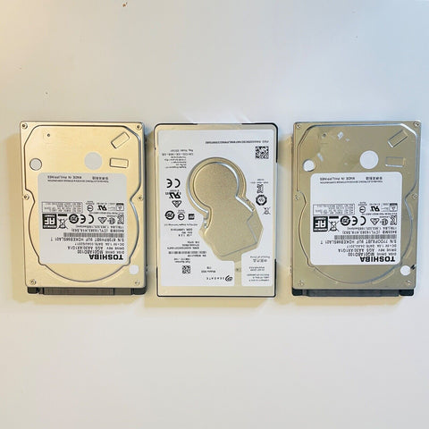 3 Defective 2.5" Hard drives, 1TB, Toshiba and Seagate , Sold For Parts/Repair