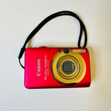 Canon PowerShot Digital Camera ELPH SD1200  10.0MP - Pink, Working needs charger